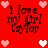 Red background with pixelated text 'i love my girl taylor' and heart symbols in pink and white.
