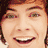 Pixelated collage of two celebrity faces with text overlays, one showing a smiling person and the other labeled "HARRY" in cyan.