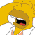 Pixelated character with long yellow hair, brown head covering, and open mouth showing black interior and red tongue against white background.