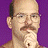 A 48x48 pixel buddy icon featuring a man with glasses and mustache on the left against purple background, and a red mailbox with "ARRESTED DEVELOPMENT" text above it on the right.