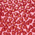 A static image of a repeating pattern composed of small square tiles in varying shades of red and pink, forming a dense, uniform background with no distinct subjects or text.