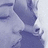 Pixelated anime-style face with closed eyes on left, purple and gray containing pink text