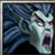 Pixelated image of a pale, monstrous face with wide eyes and an open mouth against a dark blue background.