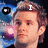 A pixelated image of a person with light brown hair against a blue and purple background, with text overlays changing across frames.