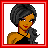 A 48x48 pixel buddy icon featuring a stylized cartoon woman with dark hair and orange skin, next to text reading "YoLySa a.k.a NeGra" in red on a white background with red borders.