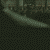Animated sequence of a dark green, stylized figure with glowing accents moving through a -like environment against black background