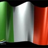 Static image of a waving flag with vertical green, white, and red stripes against a black background.