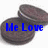 A pixelated dark brown object with a rounded shape and textured surface, overlaid by blue text reading "He Love" on a white background.