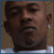 Two side-by-side pixelated portraits of Black men in a contact sheet layout, each with distinct facial features and clothing details.