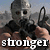 A character in a silver mask and dark clothing holds a rifle, with text changing across frames.