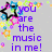 Pixelated image with purple text reading 'you are the music in me!' on gray background, surrounded by colorful star-shaped pixel clusters.