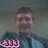 Pixelated image of a person in blue clothing with pink text overlays on white and gray backgrounds.