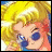 Pixelated anime-style character with blonde hair and blue eyes, next to black background with white text reading 'AnimeIM' and 'com'.