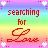A 4-frame animated contact sheet showing variations of a rainbow gradient background with heart decorations and the phrase "searching for Love" in different text styles across frames.