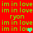 Red background with repeated green text 'im in love' and yellow text 'ryon', featuring a blue heart and gray heart in the