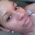 A person with light skin and dark hair appears in four showing slight head movement against a blurred background