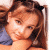 A contact sheet of two animated frames showing a person with brown hair and a blue top on the left, next to green text reading "Original Icons .com" on a dark background.