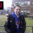 A person in a black jacket and blue scarf stands outdoors with four text overlays: 'I', 'LOVE', 'DAN<3', and no text.