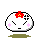 Four pixel-art frames of a white rounded character with red flower on head, pink cheeks, and closed eyes showing subtle animation changes in shadow color and shape.