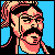 Pixelated static icon of a man with dark hair and beard against blue background, rendered in retro 8-bit style with pinkish skin tones and black outlines.