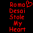 Red pixelated text on black background reads 'Roma Desai Stole My Heart' with a heart symbol replacing the letter O in Roma.