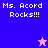 Pixelated graphic with text "Ms. Acord Rocks!!!" on blue and pink backgrounds, featuring a small star icon.