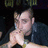 Pixelated image of a person with hands clasped near the face, next to blue text reading 'Johnny!!!!!!!!' on black background.