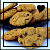 A contact sheet of two animated frames showing chocolate chip cookies with a heart icon changing color between frames.
