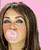 A pixelated image of a person with long brown hair against a pink background, showing two states: one without a heart symbol and another with a white heart in the top-right corner.
