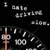 A digital speedometer display with a red needle pointing at 0, showing '0' and '100' numerals, and text 'I hate driving' and 'slow.' above it on a black background.