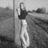 Black-and-white pixelated image of a person standing outdoors with text reading "Bianca-Elite Modeling" on the right side.