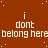 Brown background with yellow dots, repeated white text "i dont belong here" in three