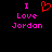 Pixelated text and symbols on black background: 'I' above a red heart, then 'Love Jordan' below in pink.