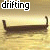 A small boat drifts across a golden water surface with text labels changing above it.