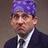Pixelated portrait of a person wearing purple head covering and dark suit with white shirt, static image.