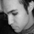 A split-screen image shows a grayscale portrait on the left and a color version with a gray mask overlay on the right.
