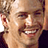 Static 48x48 pixel icon of a smiling man with light brown hair and visible facial features including eyes, nose, mouth, and ear, rendered in low-resolution pixel art style with warm tones.