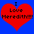 Two identical red heart shapes on a blue background with black text reading "I Love Meredith!!!!" inside each heart.