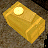 A pixelated golden bar with a bright circular highlight on its upper left surface, resting on a textured brown background.