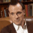 A 48x48 pixel buddy icon split into two frames showing a person in front of bookshelves and green text reading "Original Icons .com" on the right frame.