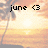Pixelated beach sunset scene with palm trees, displaying sequential date text and a heart symbol.
