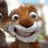 Pixelated cartoon squirrel with brown fur and white chest, smiling widely against a blurred background.