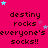 A static image with a bright pink background displays repeated text "destiny rocks everyone's socks!!" in black pixelated font, surrounded by small blue and purple stars.