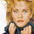 Pixelated static image of a person with curly blonde hair wearing a dark blue top, red lipstick, and visible hands near the chest area against a white background.