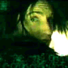 nine shows a person with dark hair and greenish skin tones in various poses against a dark background with light patches