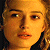 A pixelated contact sheet showing two frames of an animated icon featuring a woman's face on the left and green text reading "Original Icons .com" on the right against a dark background.