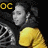 Pixelated image of a person in yellow clothing with gray background, featuring text elements and animation changes.