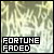 Pixelated static image with abstract light green and beige background, black rectangular text box containing white pixelated text reading FORTUNE FADED.