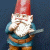 Pixelated garden gnome with red hat and white beard stands against dark blue background, green text 'OriginalIcons.com' on right.