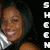 A pixelated image of a person with dark hair wearing a white collar, positioned between vertical text blocks on black background.